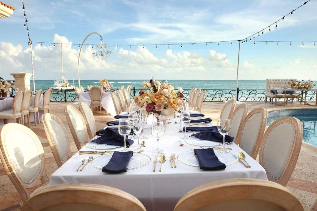 wedding reception table with ocean view in the riviera maya