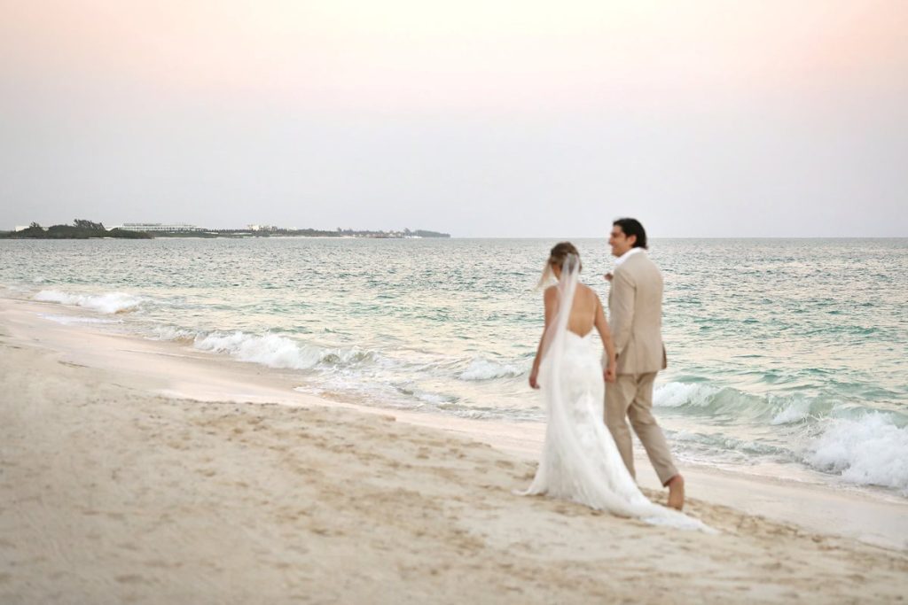 just married couple photography walking at the beach in the riviera maya