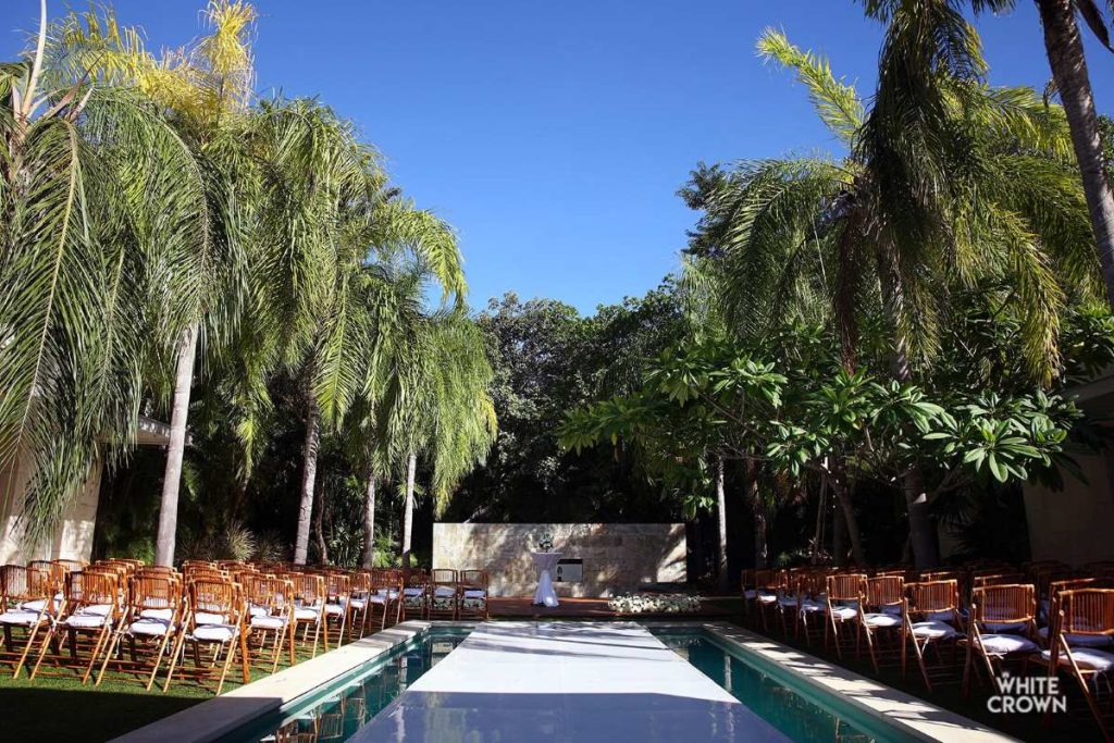 Over the water wedding ceremony at a luxury boutique resort in the riviera maya