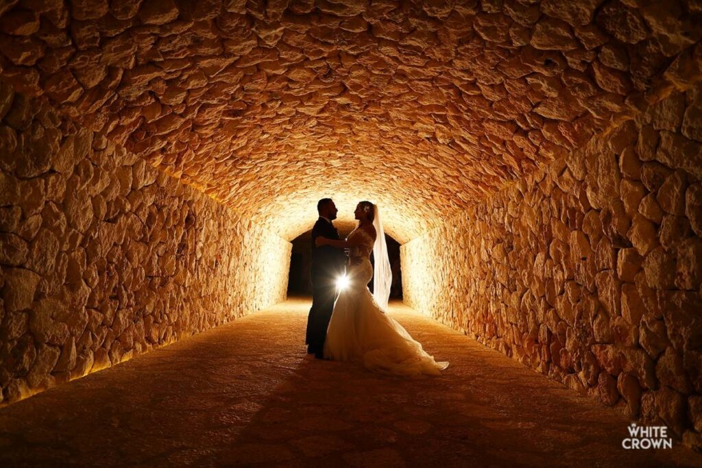 Married couple posing for an artistic wedding photography in the riviera maya